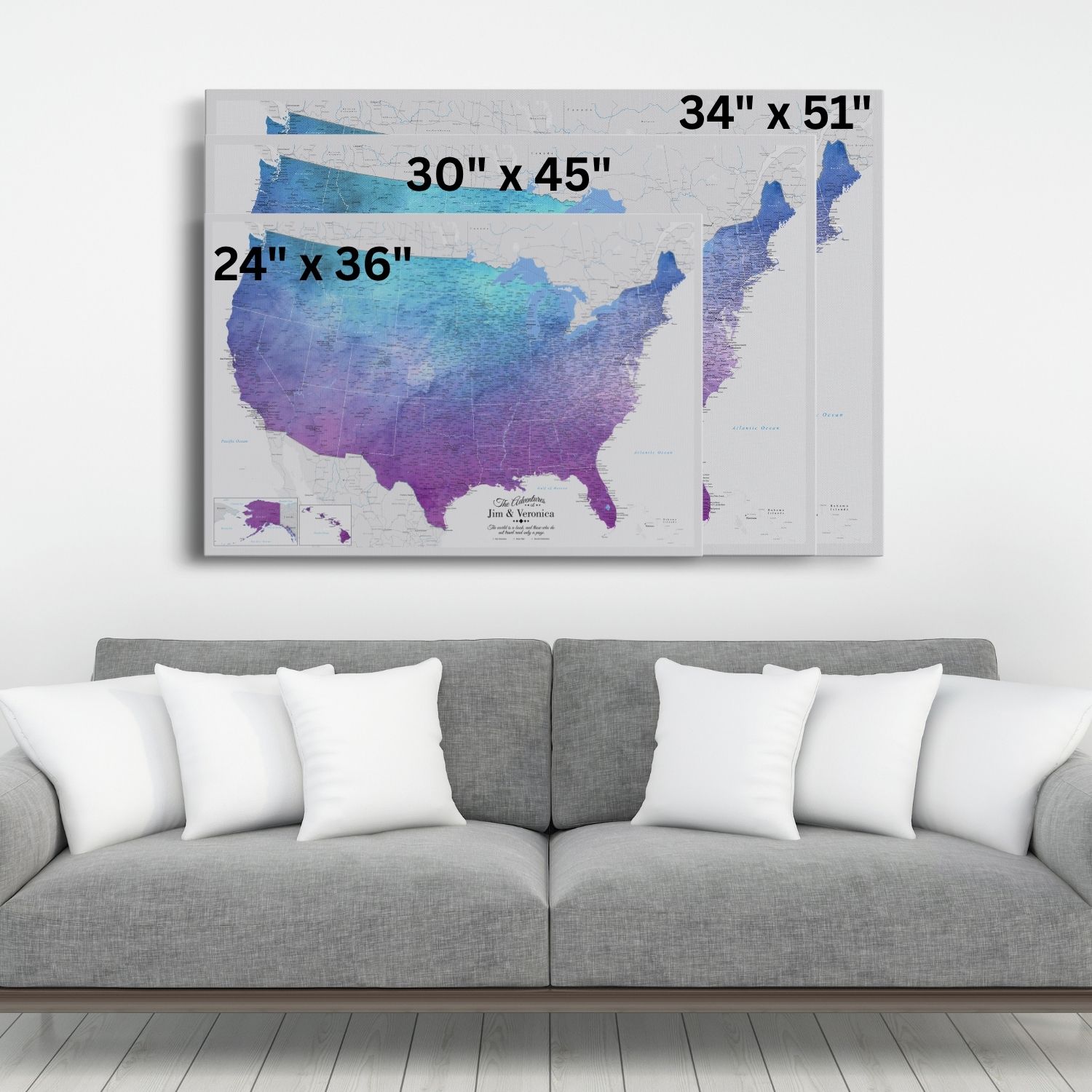 Vibrant Violet Watercolor USA push pin map canvas displayed above gray sofa showing three size options