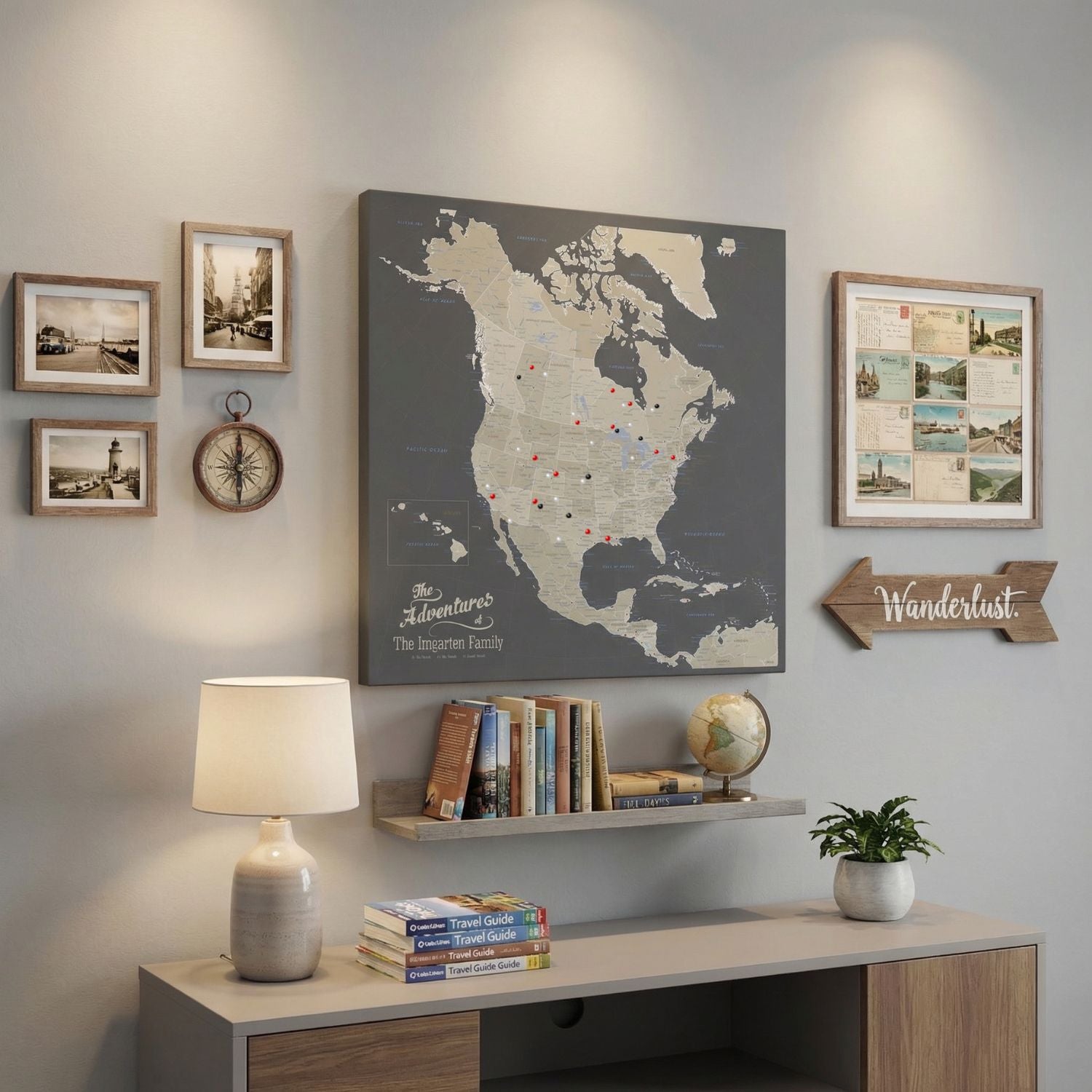 Personalized earth toned North America travel map with push pins displayed on gallery wall with travel decor