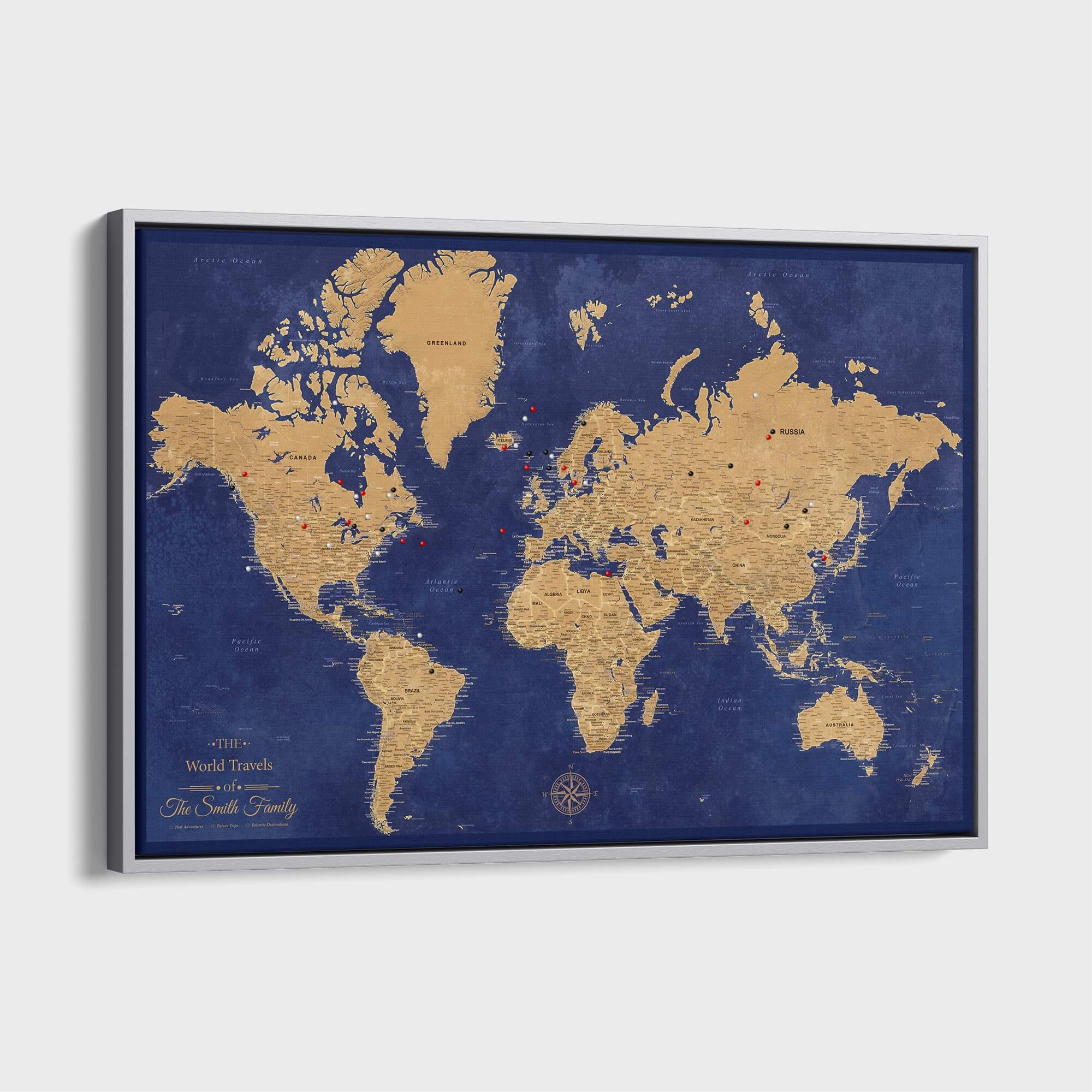 Personalized gold and navy framed canvas world travel map with push pins in silver frame
