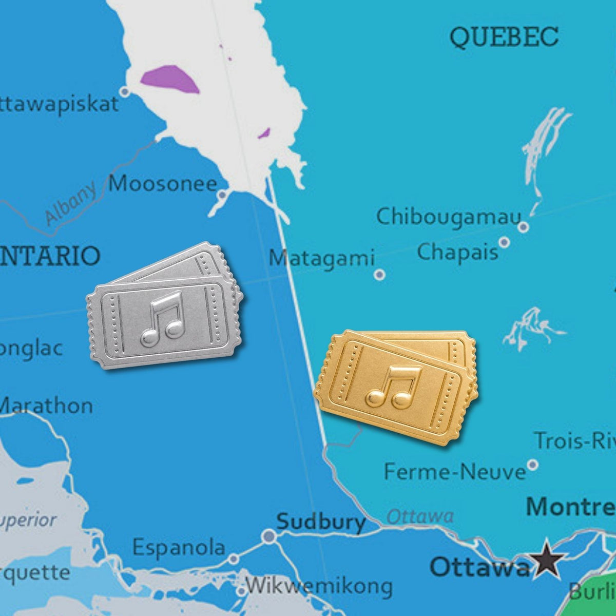 Gold and silver concert ticket push pins displayed on Ontario Quebec Canada map