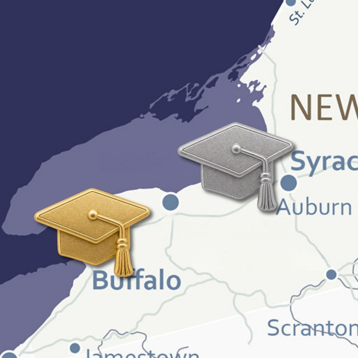 Gold and silver graduation cap push pins displayed on New York state map backdrop