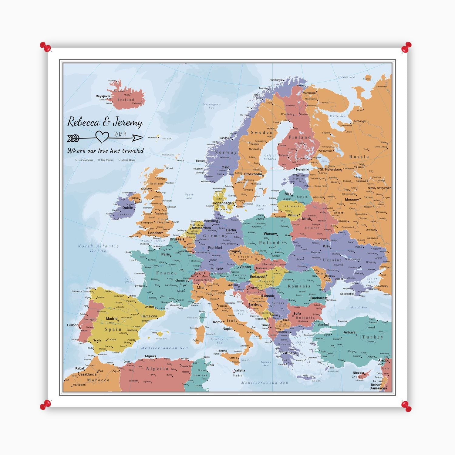 Personalized Blue Oceans Europe canvas map poster pinned to wall with red push pins showing colorful countries and capitals
