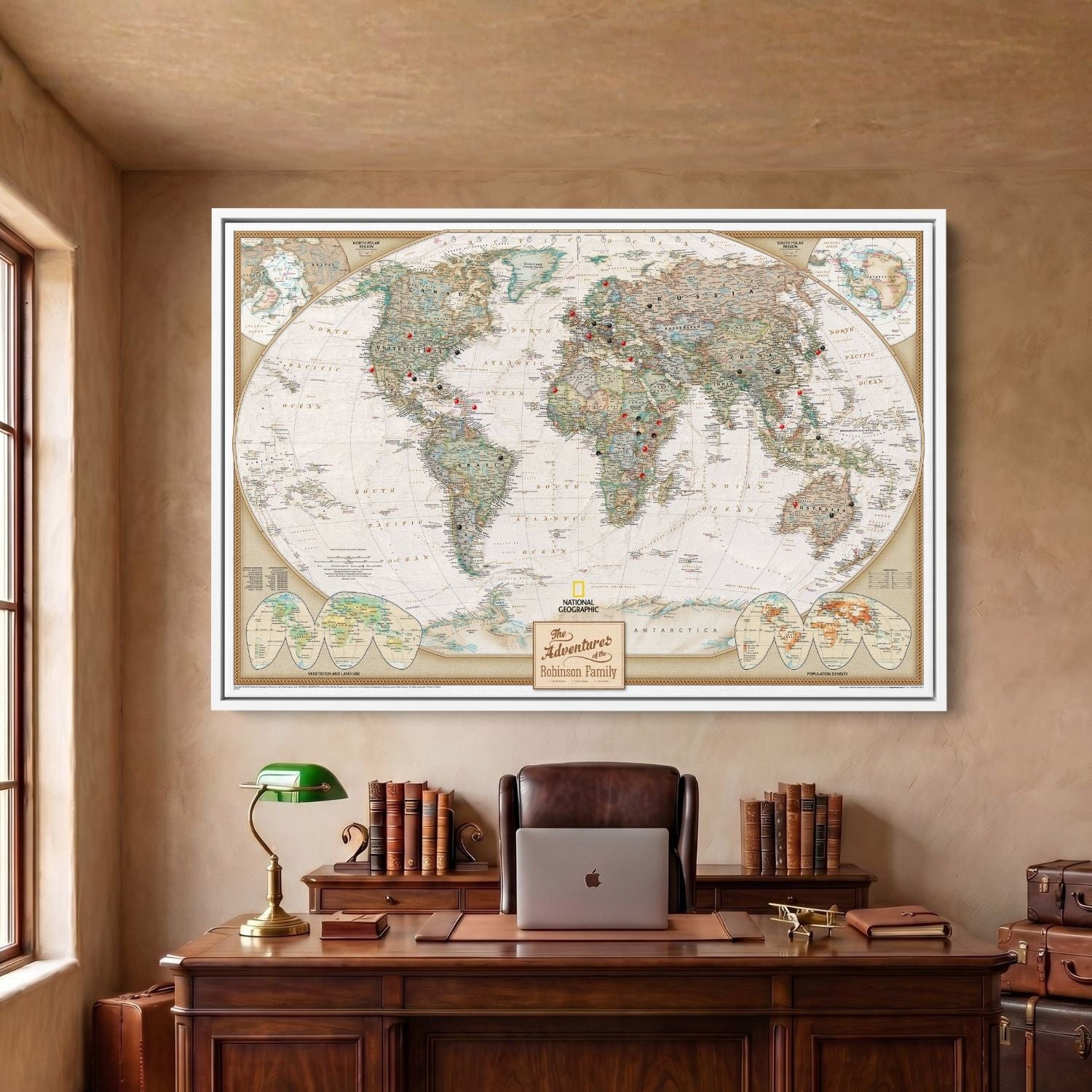 Framed canvas executive world travel map in White frame with red and black pins hung above desk