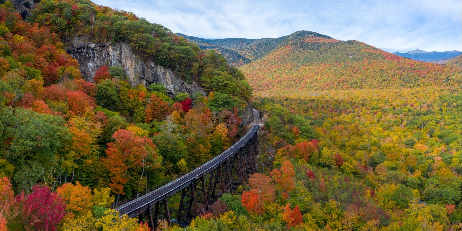 White Mountains, New Hampshire with train track trestle 