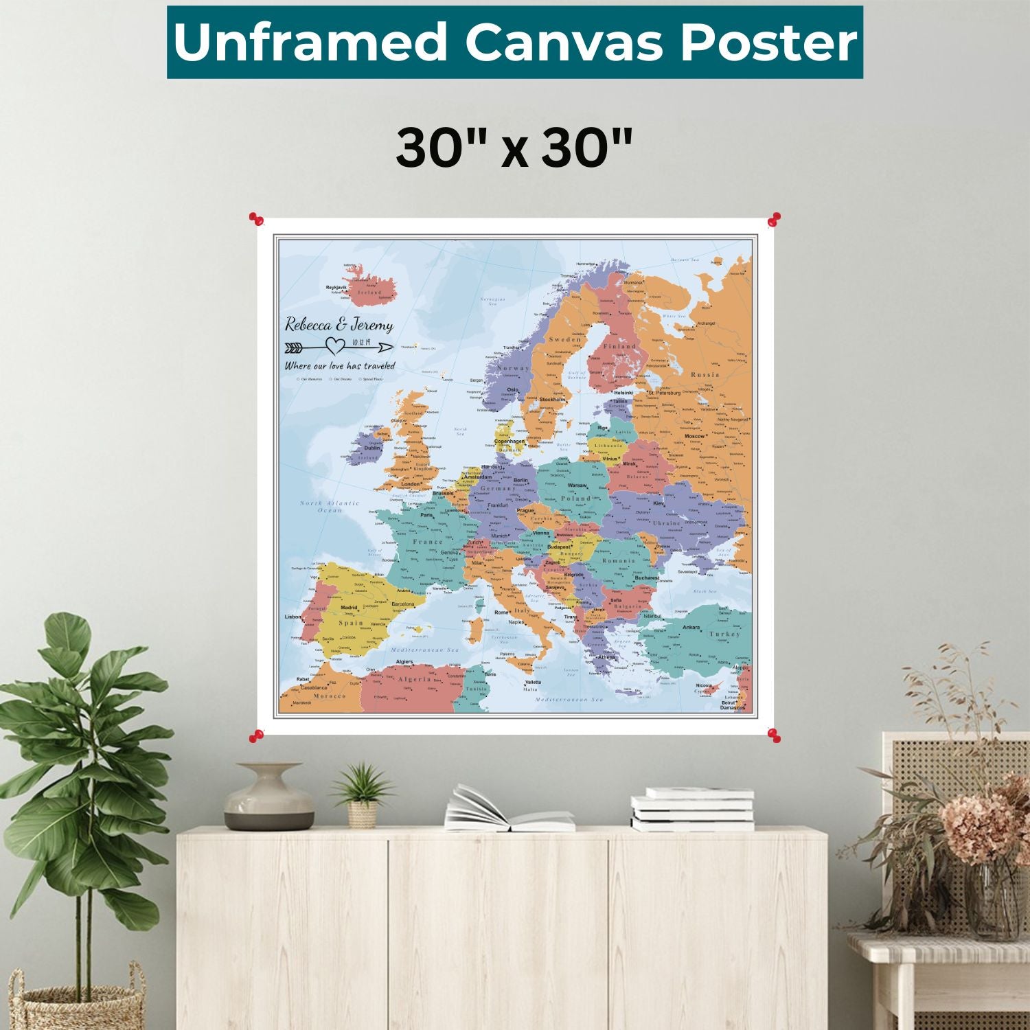 Personalized blue oceans Europe canvas map poster pinned to gray wall above modern credenza in living room