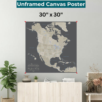 Personalized earth toned North America canvas map poster in gray and tan pinned to living room wall