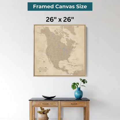 26x26 inch framed canvas vintage North America travel map with pins hanging above wooden console table
