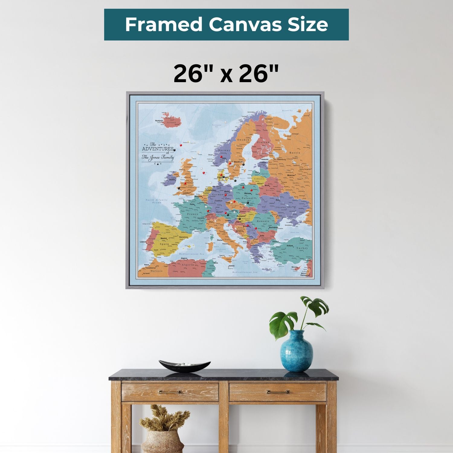 Personalized blue oceans Europe travel map with push pins displayed in gray frame above console table