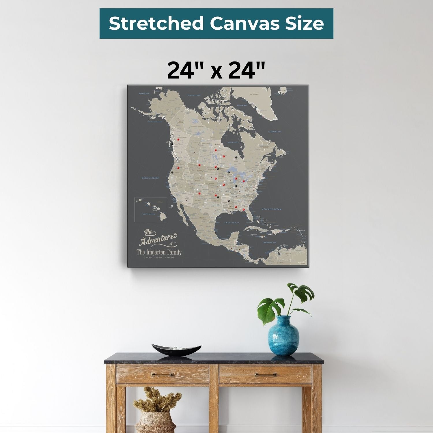 24x24 earth toned North America travel map with push pins on gallery wrapped canvas hung above console table