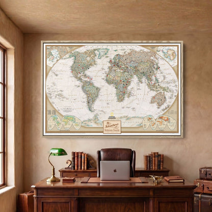 Framed canvas executive world travel map in Natural frame with red and black pins hung above desk
