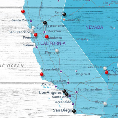 Closeup of Pins on Light Blue Anniversary Map